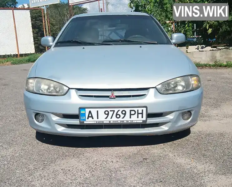 Mitsubishi Colt 1998, фото з оголошення 1 з 7, VIN JMBMNCJ1AWU005130