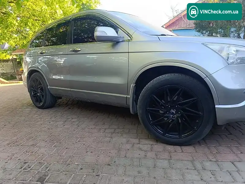 Honda CR-V 2007, фото з оголошення 2 з 8, VIN SHSRE67707U027316
