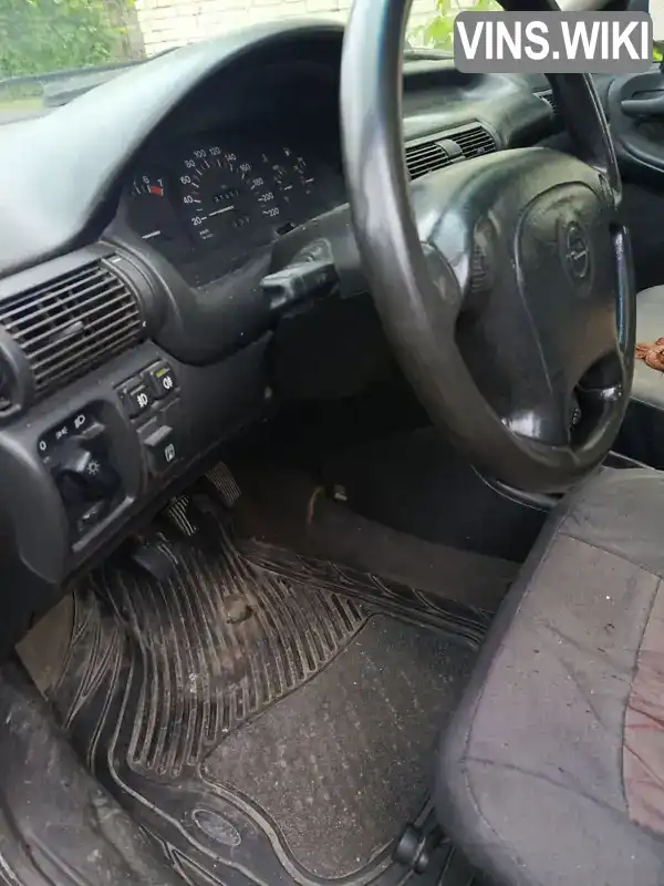 Opel Astra 1995, фото з оголошення 2 з 8, VIN W0L000057S5071795