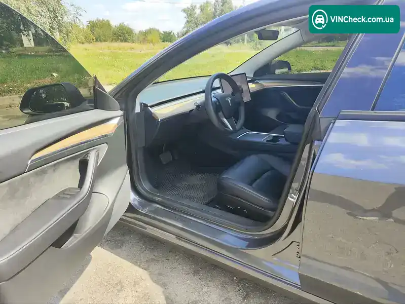 Tesla Model 3 2023, фото з оголошення 2 з 21, VIN 5YJ3E1EB0PF677401