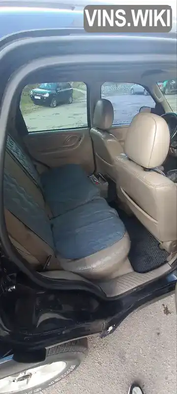 Mazda Tribute 2005, фото з оголошення 2 з 20, VIN 4F2YZ06125KM10352