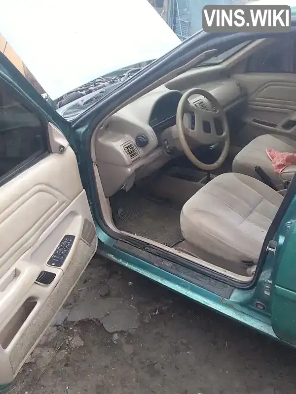 Ford Tempo 1994, фото з оголошення 1 з 8, VIN XTH310200C0000620