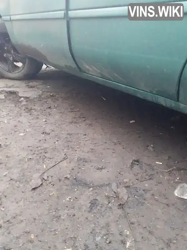 Ford Tempo 1994, фото з оголошення 2 з 8, VIN XTH310200C0000620