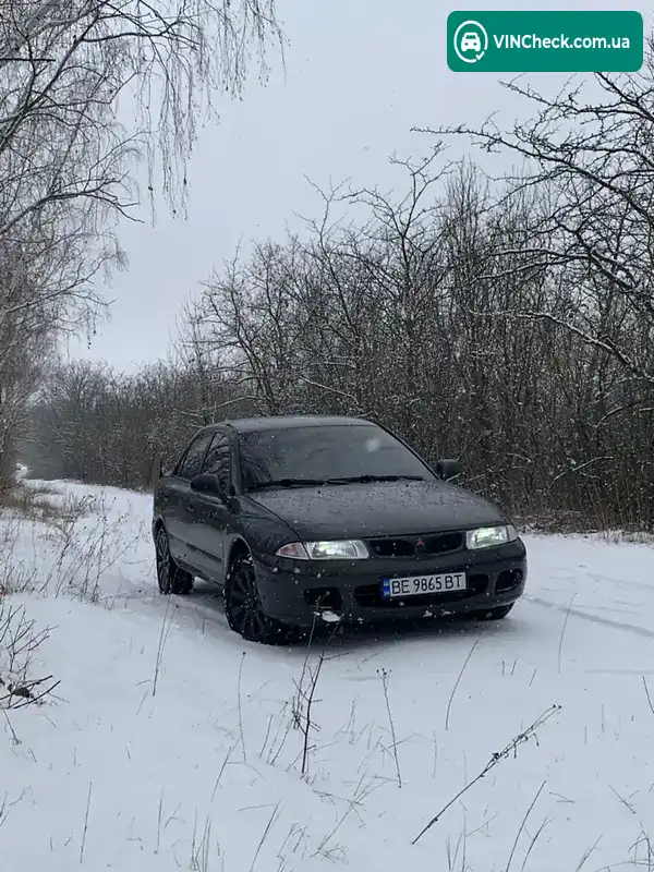 Mitsubishi Carisma 1997, фото з оголошення 1 з 7, VIN XMCSNDA2AVF009042