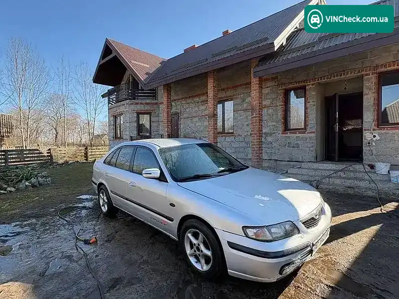 Mazda 626 1999, фото з оголошення 1 з 7, VIN JMZGF14R201239400