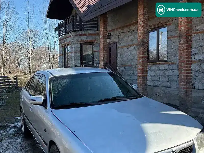 Mazda 626 1999, фото з оголошення 2 з 7, VIN JMZGF14R201239400