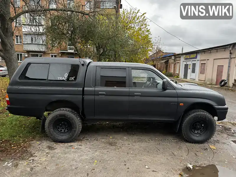 Mitsubishi L 200 1997, фото з оголошення 2 з 7, VIN MMBJNK740WD039838