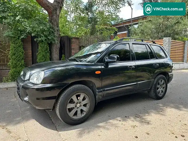 Hyundai Santa FE 2002, фото з оголошення 2 з 16, VIN KMHSC81BP2U292043