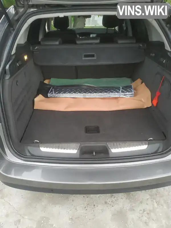 Renault Laguna 2010, фото з оголошення 2 з 13, VIN VF1KT0A0644137057