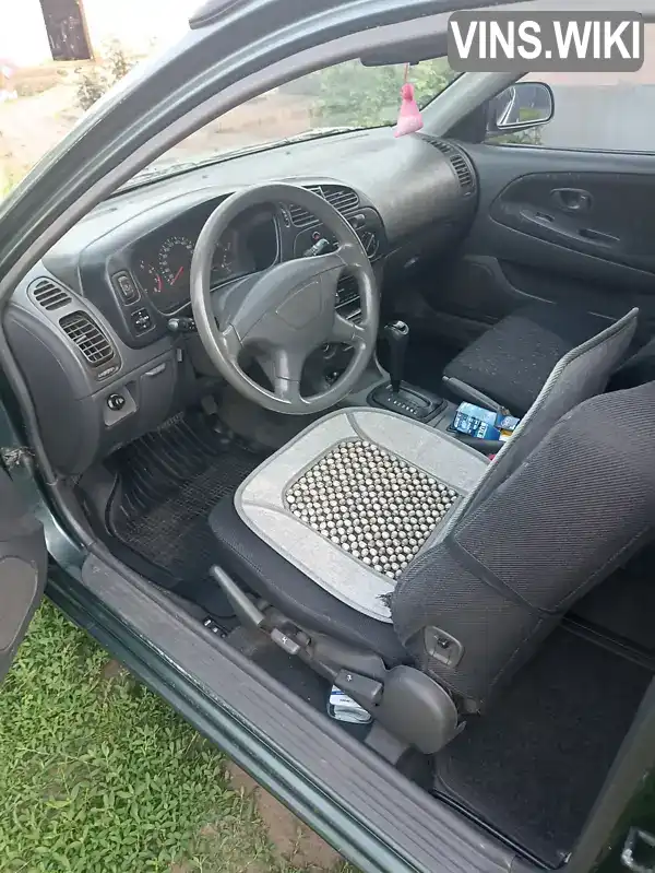 Mitsubishi Colt 2003, фото з оголошення 1 з 6, VIN JMBMRCJ4A3U000449