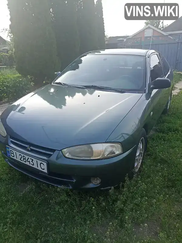 Mitsubishi Colt 2003, фото з оголошення 2 з 6, VIN JMBMRCJ4A3U000449