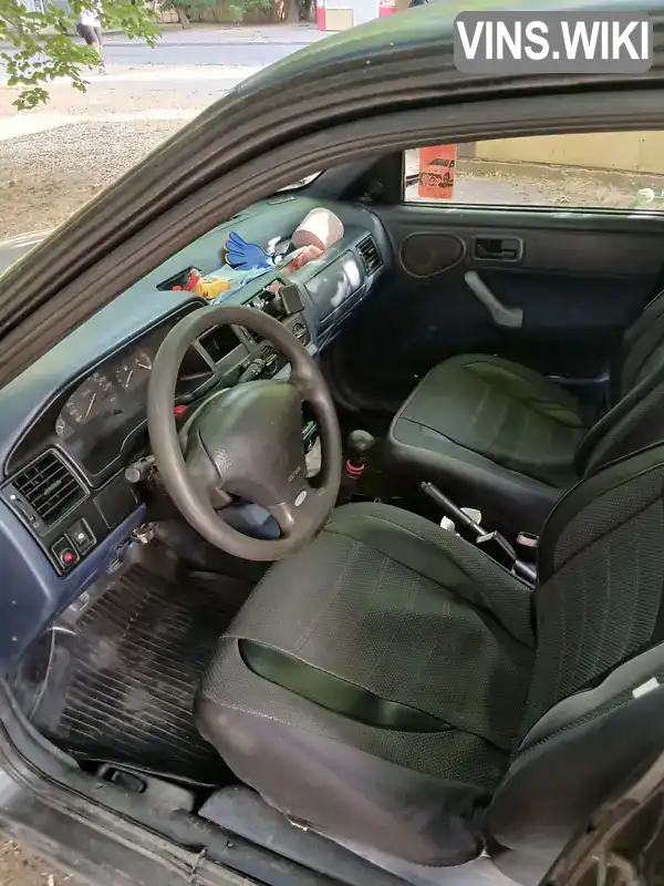 Ford Escort 1994, фото з оголошення 2 з 12, VIN WF0AXXGCAARS07260