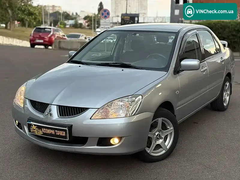 Mitsubishi Lancer 2003, фото з оголошення 2 з 18, VIN JMBSRCS3A4U001041