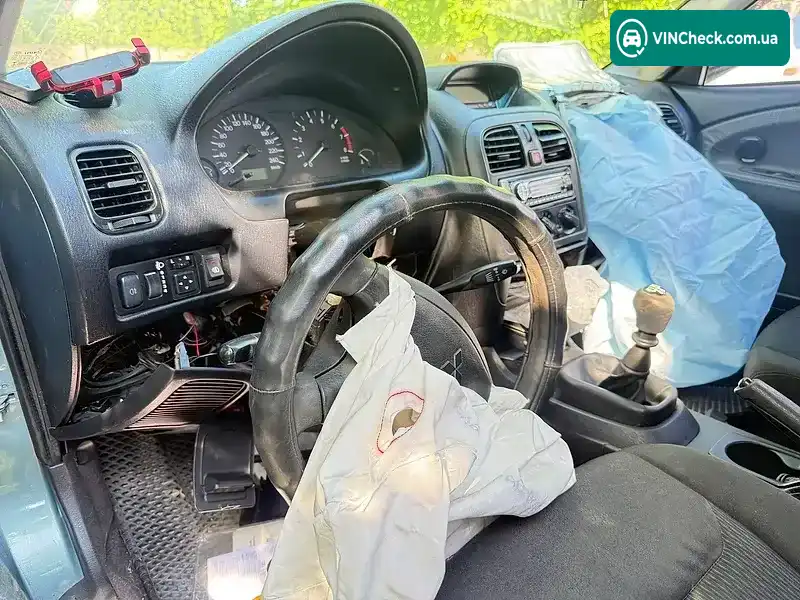 Mitsubishi Carisma 2003, фото з оголошення 2 з 20, VIN XMCSNDA1A3F038451
