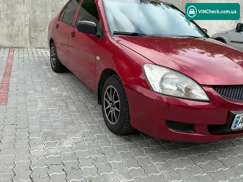 Mitsubishi Lancer 2004, фото з оголошення 2 з 12, VIN JMYSRCS1A4U781457