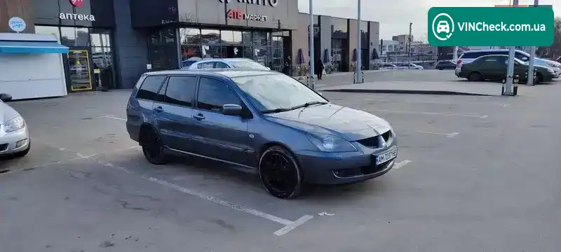 Mitsubishi Lancer 2004, фото з оголошення 2 з 17, VIN JMBLNCS3W5U000907