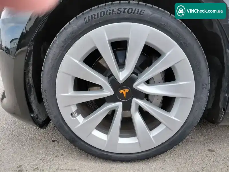 Tesla Model 3 2023, фото з оголошення 2 з 12, VIN 5YJ3E1EAXPF585512