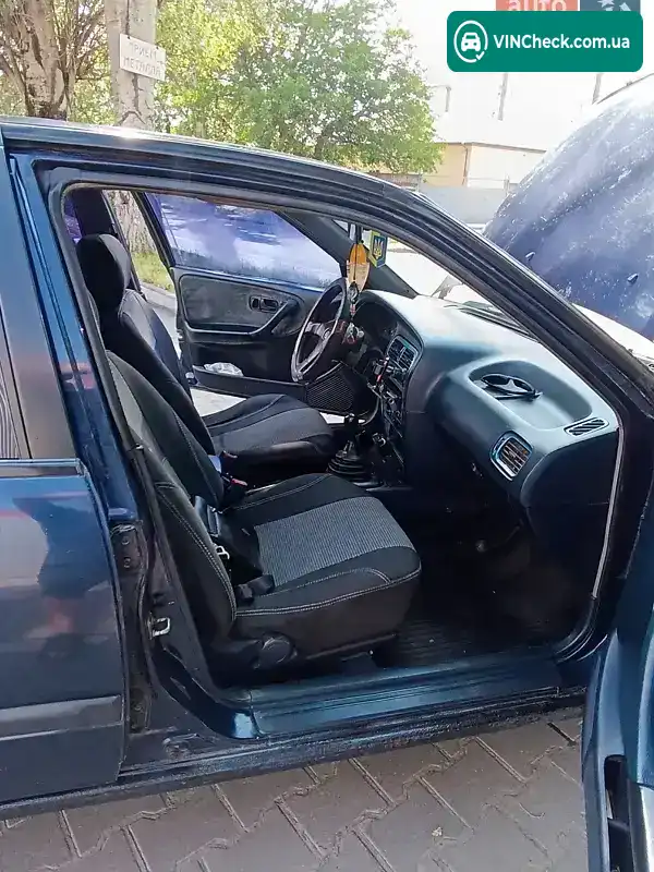 Nissan Primera 1992, фото з оголошення 2 з 16, VIN SJNBAAP10U0048199