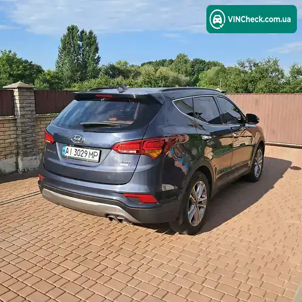 Hyundai Santa FE 2015, фото з оголошення 2 з 9, VIN KMHSW81UDGU559812