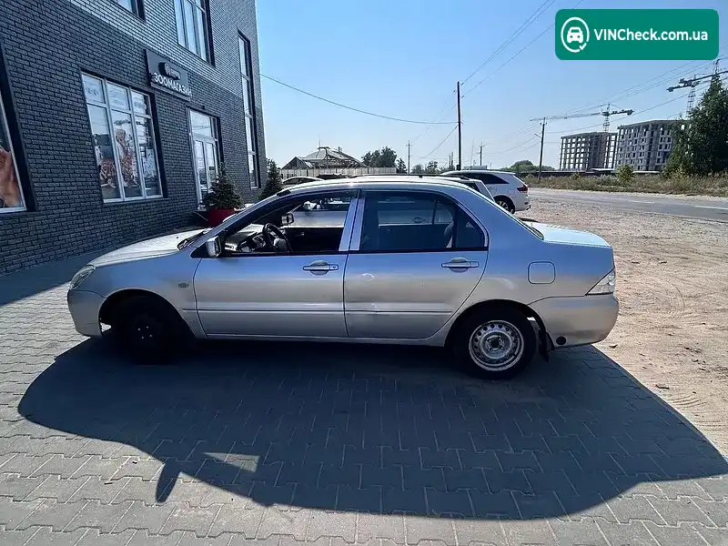 Mitsubishi Lancer 2004, фото з оголошення 2 з 8, VIN JMYSRCS1A4U783096
